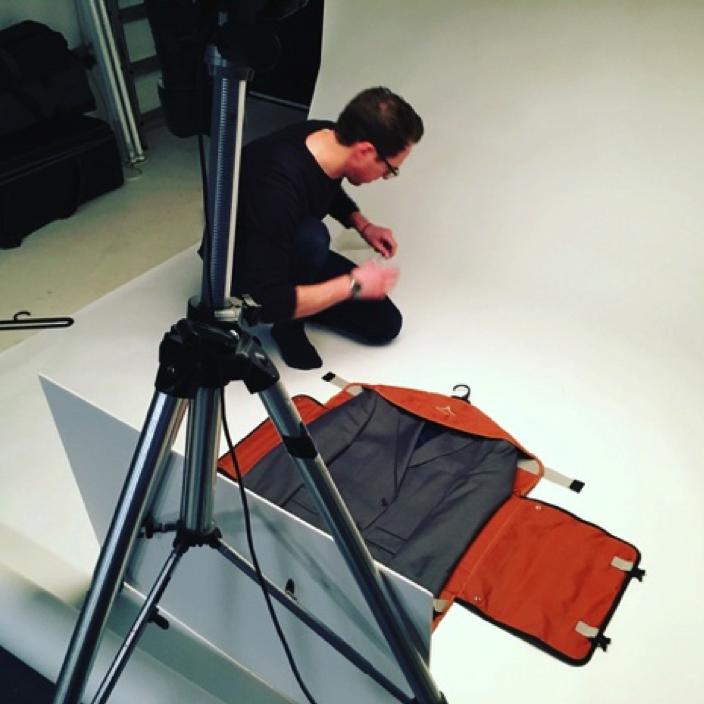 Charlie at work in the studio preparing the PLIQO bag for shooting.